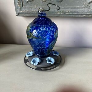 Blown glass blue bird feeder